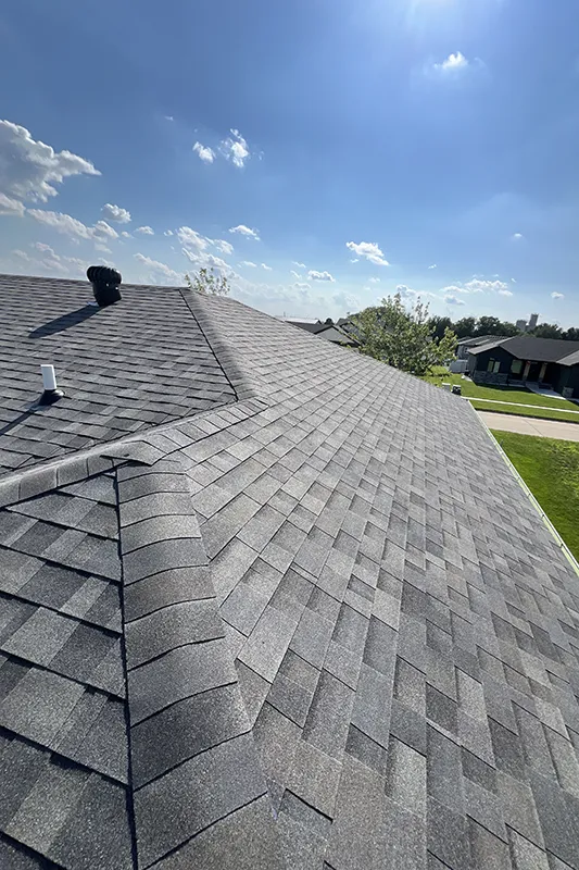 New shingles on a home by Triumph Roofing Company